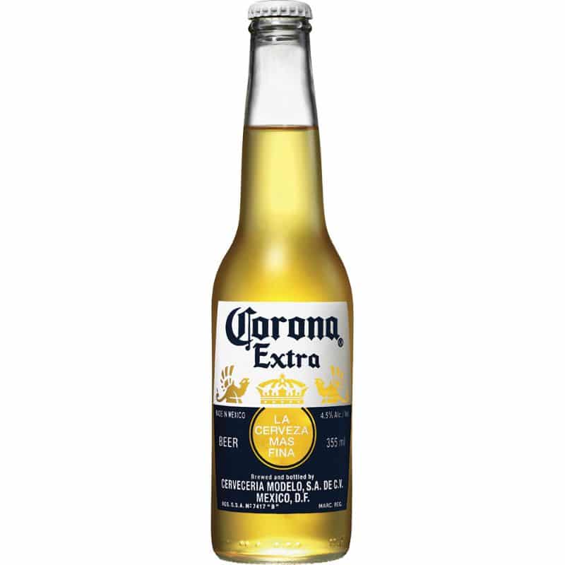 Corona Extra beer 335ml Bottle standing against white background.