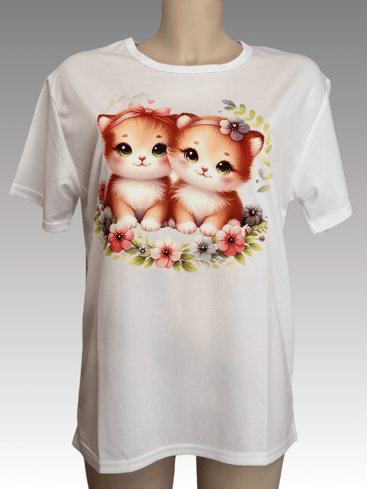 beautiful white female t-shirt with two kittens, smiling.
