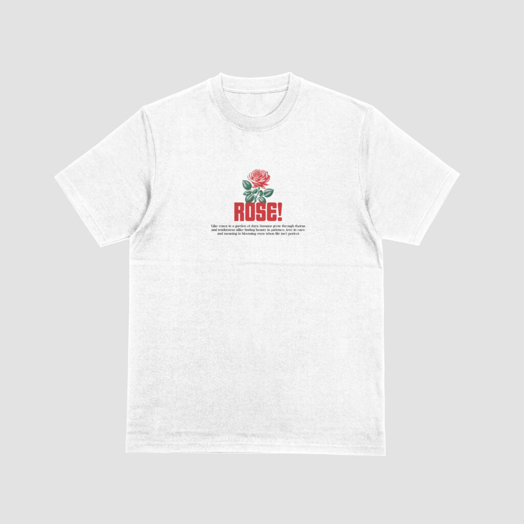 FRONT VIEW OF THE WHITE T-SHIRT WITH A VIBRANT RED ROSE PRINT ON IT.
